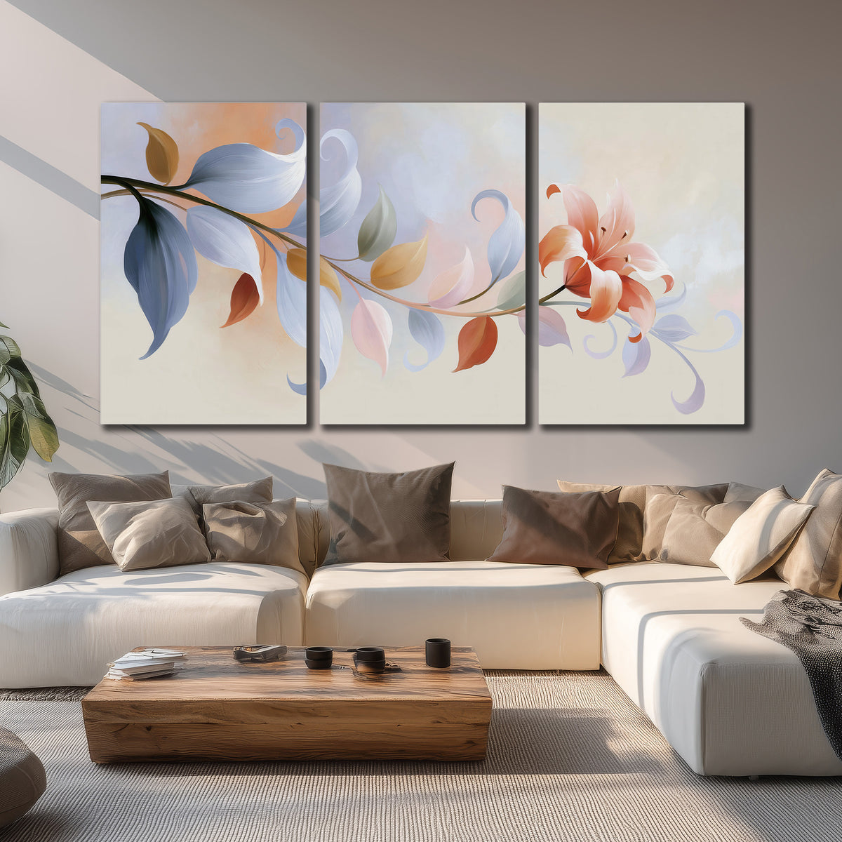 Peach blossoms and blue-green leaves in an airy cream-colored composition 3 piece canvas wall art displayed in a living room