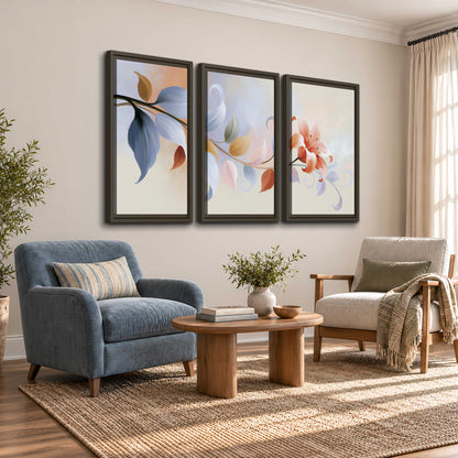 Peach blossoms and blue-green leaves in an airy cream-colored composition 3 piece framed canvas wall art styled in an interior