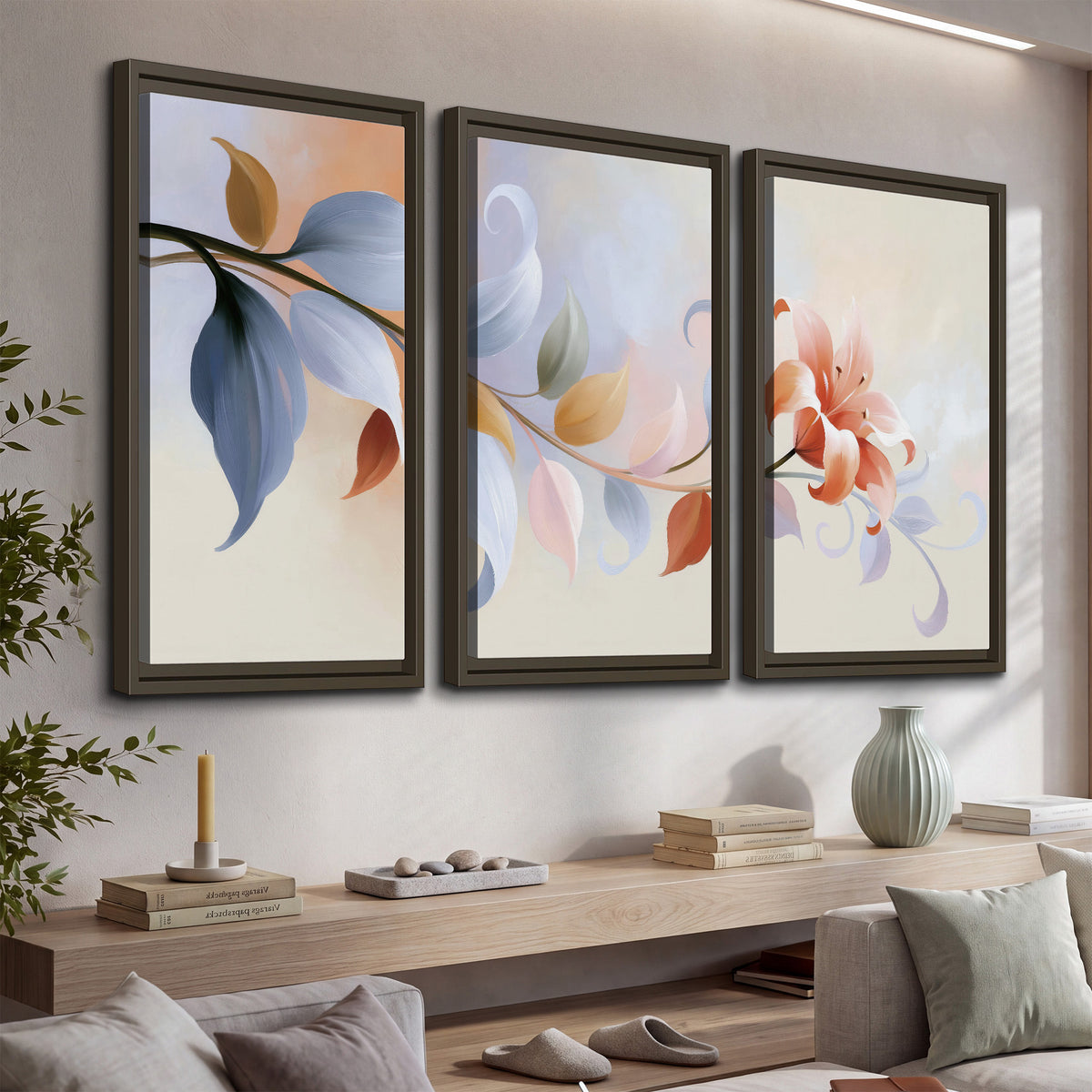 Peach blossoms and blue-green leaves in an airy cream-colored composition 3 piece framed canvas wall art displayed in a console