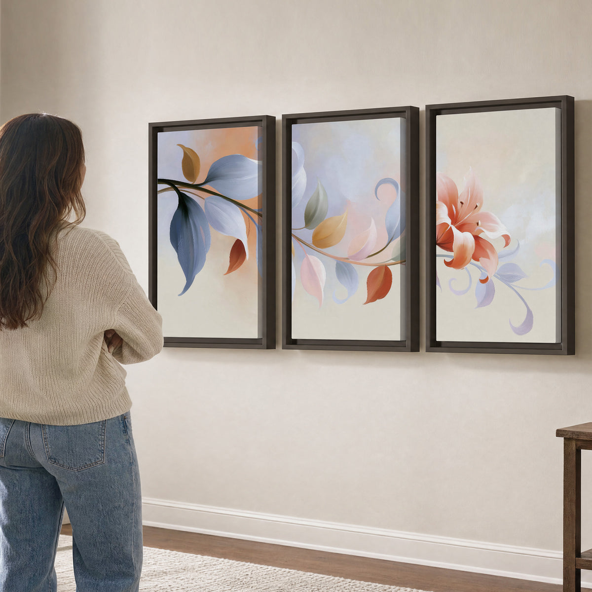 Peach blossoms and blue-green leaves in an airy cream-colored composition 3 piece framed canvas wall art three panel arrangement on a wall