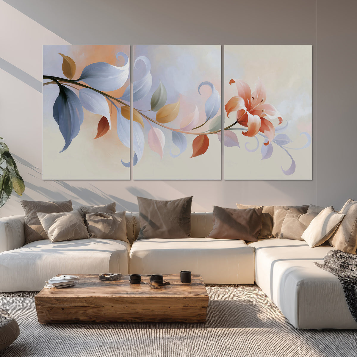 Peach blossoms and blue-green leaves in an airy cream-colored composition set of 3 poster prints displayed in a living room
