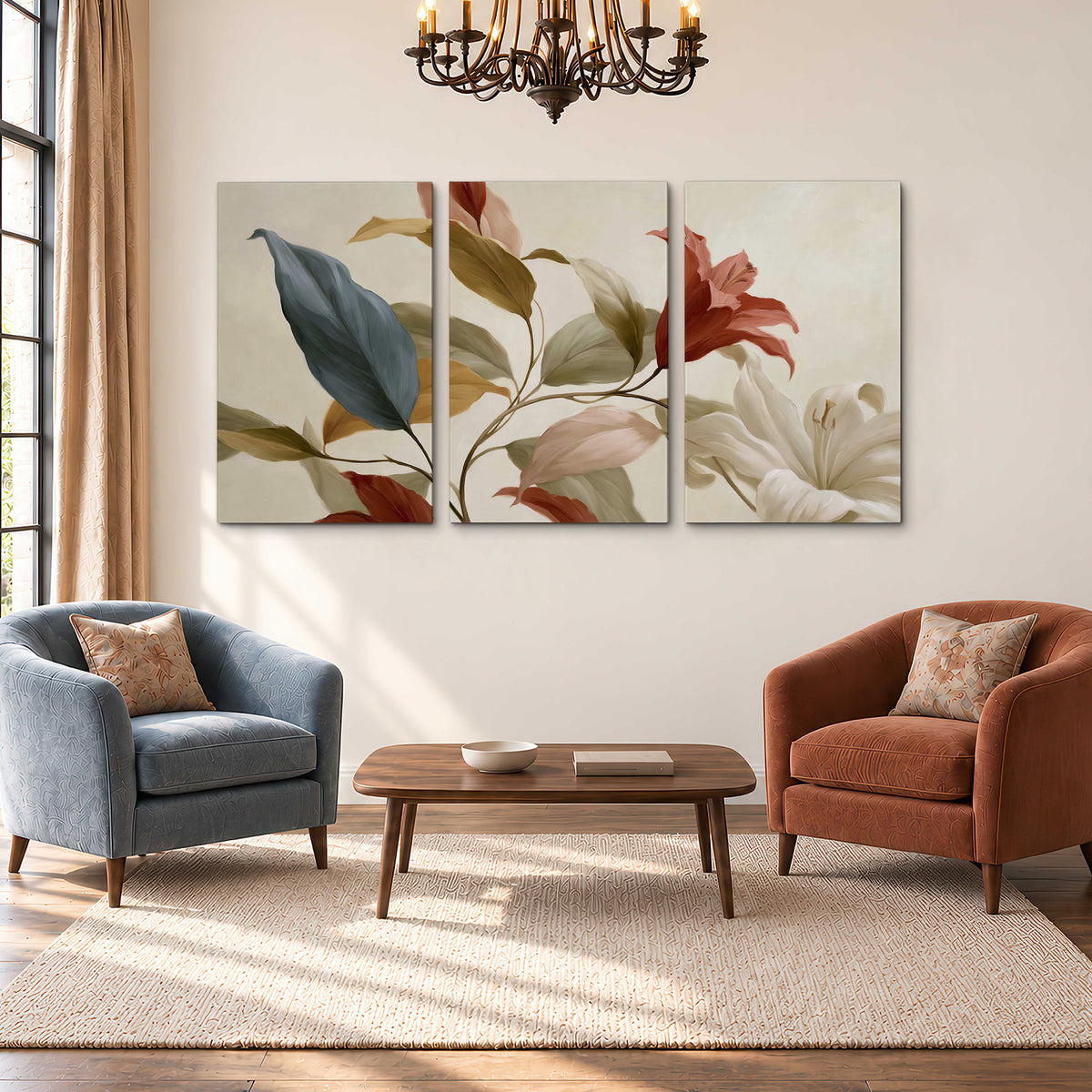 Cream flowers with broad blue and rust leaves sweeping across a neutral background 3 piece canvas wall art styled in an interior