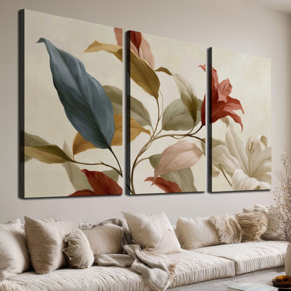 Cream flowers with broad blue and rust leaves sweeping across a neutral background 3 piece canvas wall art room and product view