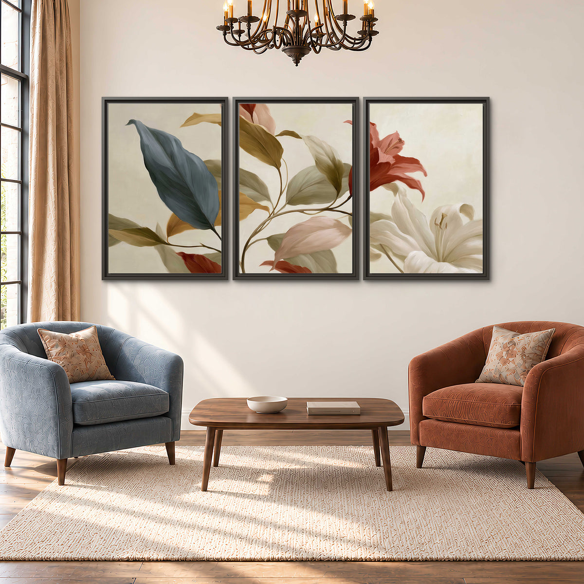 Cream flowers with broad blue and rust leaves sweeping across a neutral background 3 piece framed canvas wall art styled in an interior