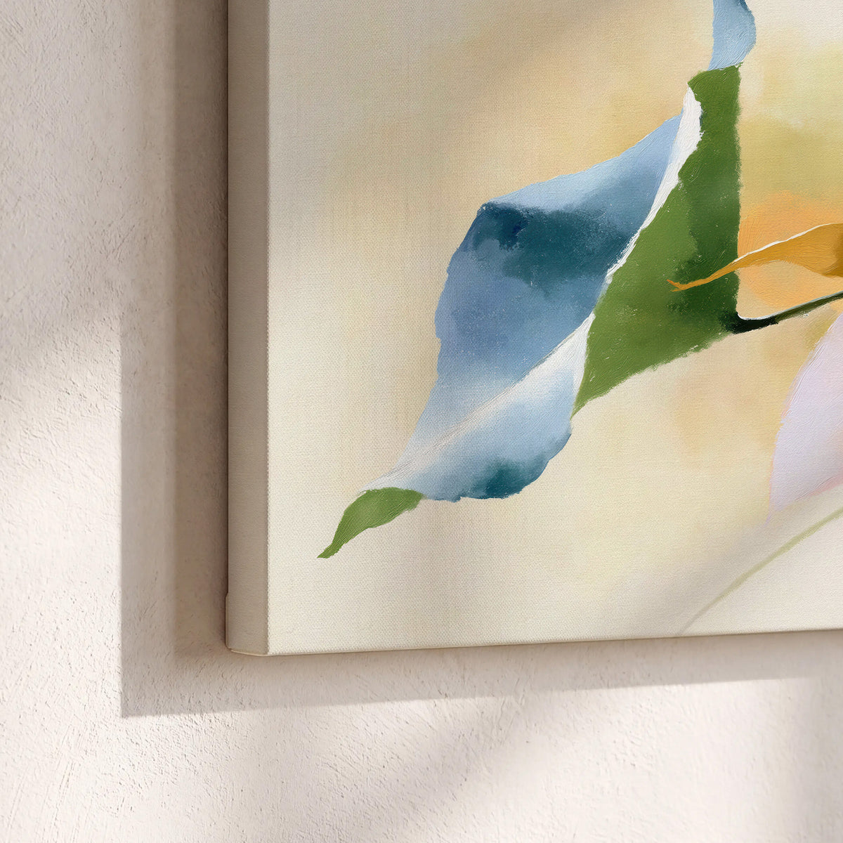 Airy green, orange and blue organic shapes floating across a white background 3 piece canvas wall art material and edge close up