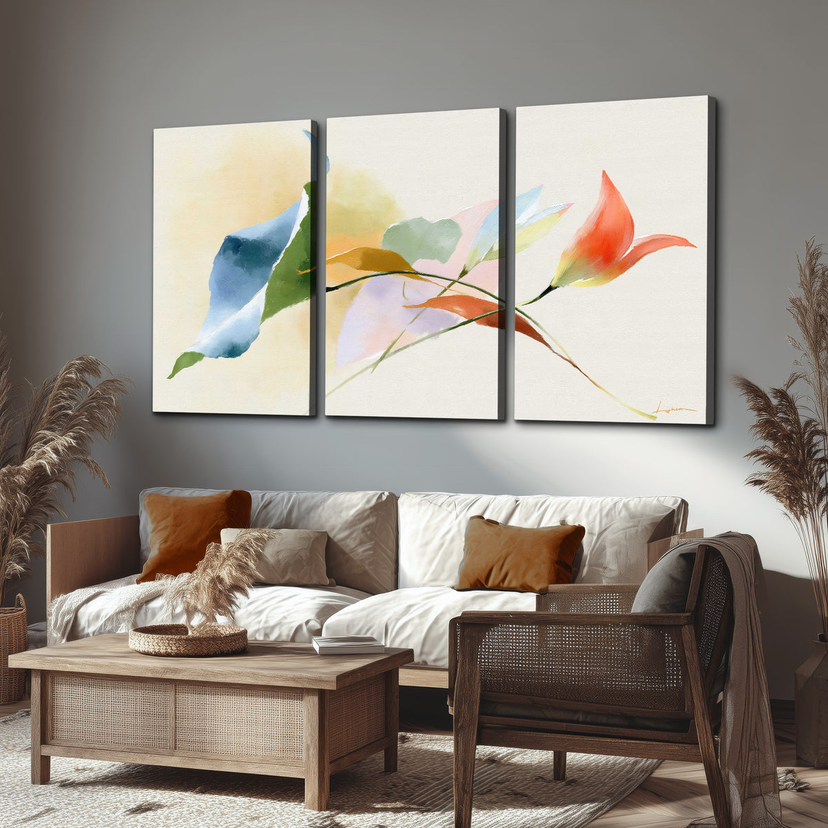 Airy green, orange and blue organic shapes floating across a white background 3 piece canvas wall art displayed in a rustic living room
