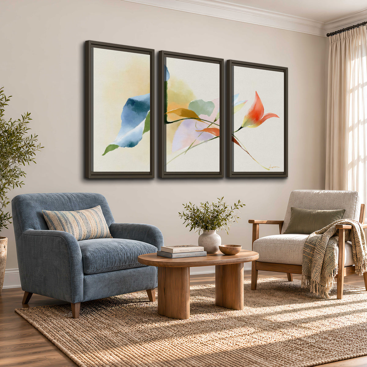 Airy green, orange and blue organic shapes floating across a white background 3 piece framed canvas wall art styled in an interior
