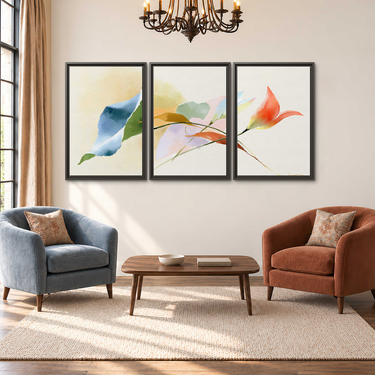 Airy green, orange and blue organic shapes floating across a white background 3 piece framed canvas wall art styled in an interior