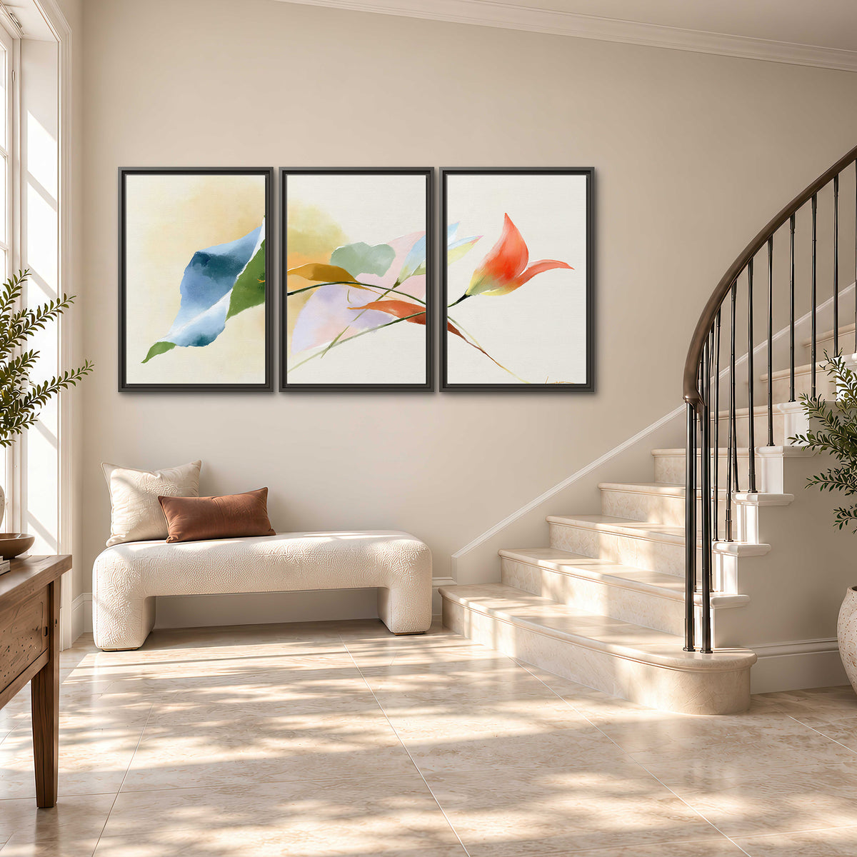 Airy green, orange and blue organic shapes floating across a white background 3 piece framed canvas wall art styled in an interior