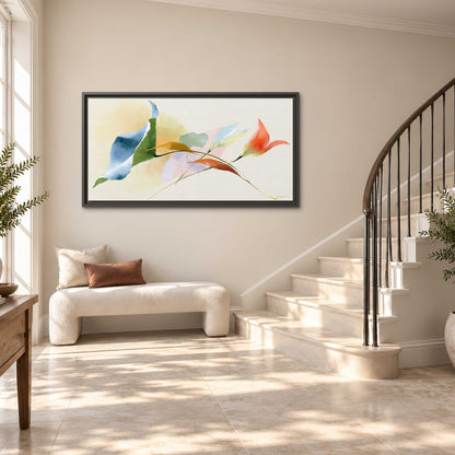 Airy green, orange and blue organic shapes floating across a white background single framed canvas wall art styled in an interior