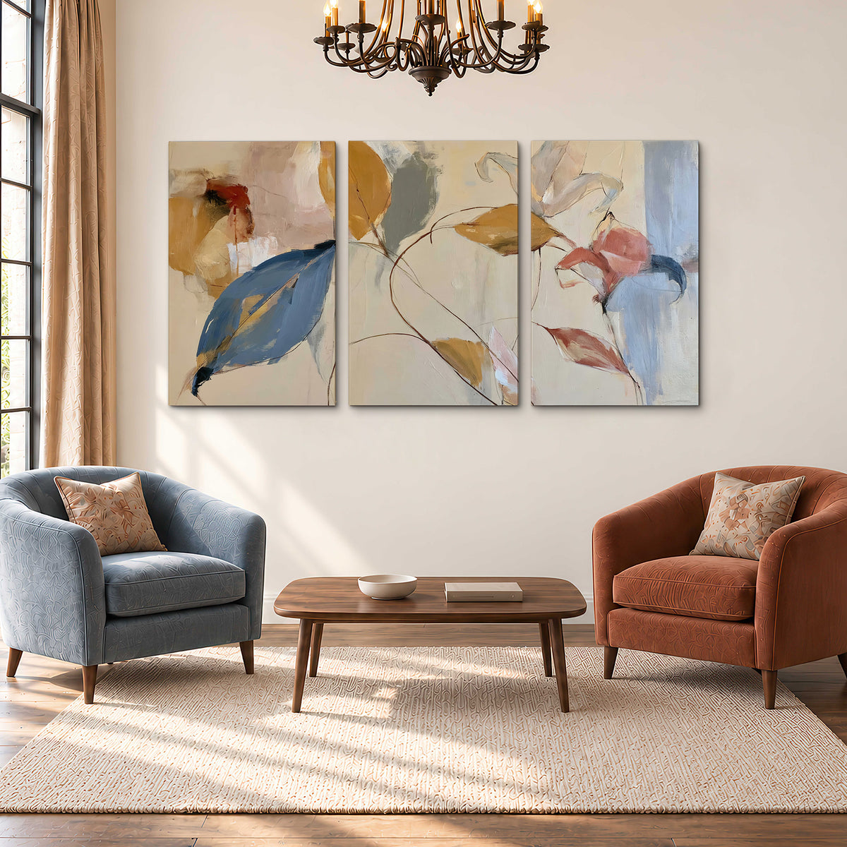 Loose ochre, blue and pink leaves arranged on a pale layered background 3 piece canvas wall art styled in an interior