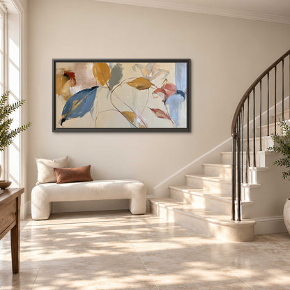 Loose ochre, blue and pink leaves arranged on a pale layered background single framed canvas wall art styled in an interior