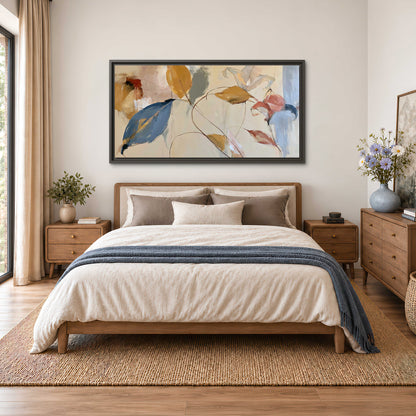 Loose ochre, blue and pink leaves arranged on a pale layered background single framed canvas wall art styled in an interior