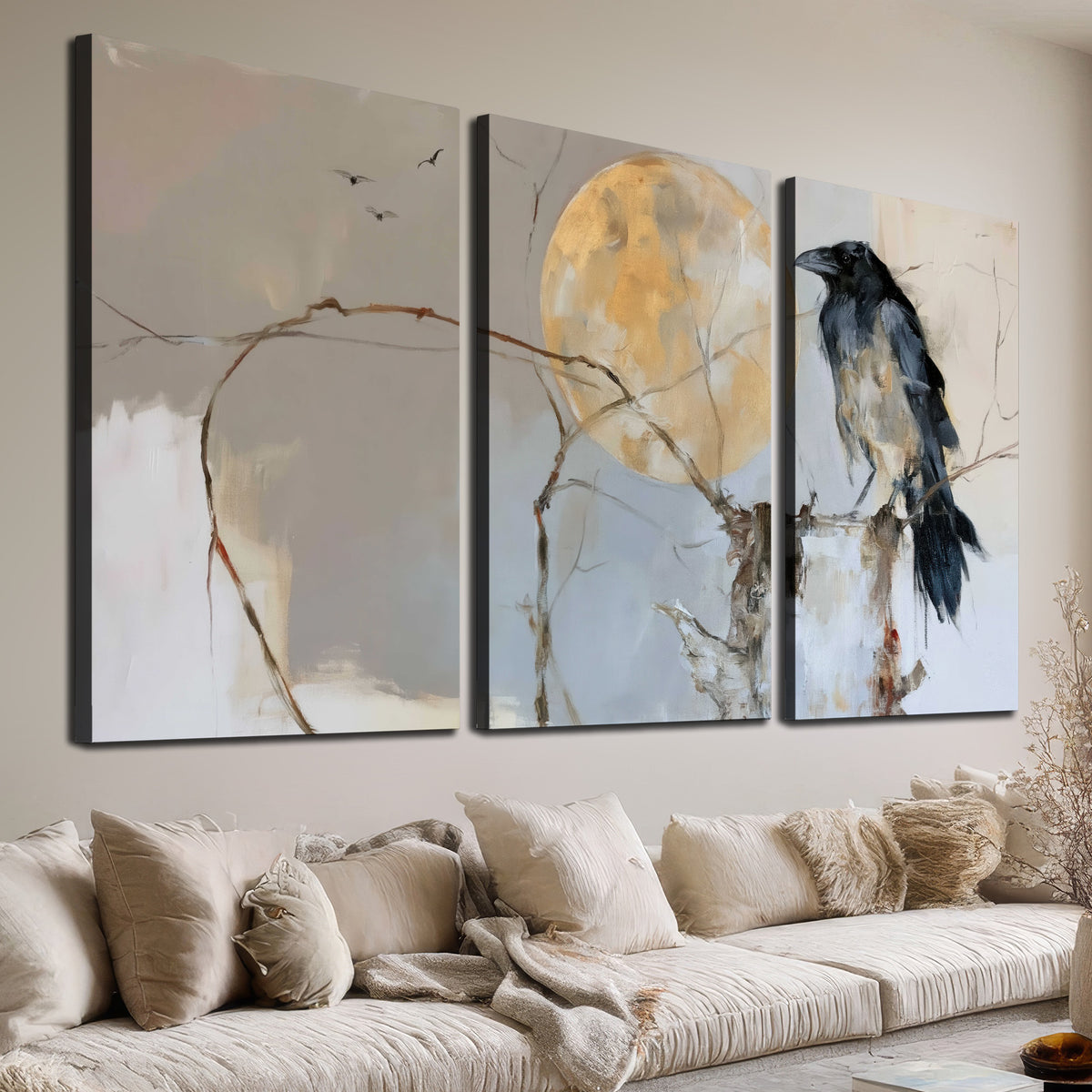A dark raven beside a golden moon amid pale blue and cream painterly strokes 3 piece canvas wall art room and product view