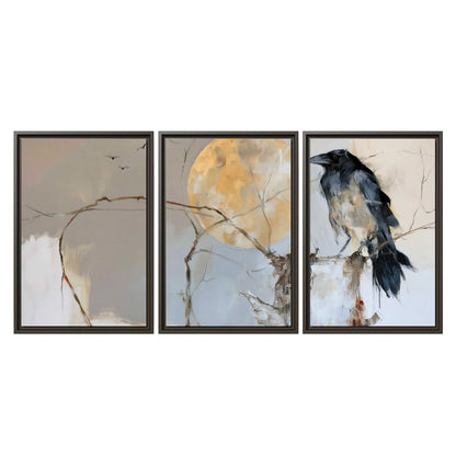 A dark raven beside a golden moon amid pale blue and cream painterly strokes 3 piece framed canvas wall art viewed straight on