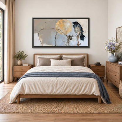 A dark raven beside a golden moon amid pale blue and cream painterly strokes single framed canvas wall art styled in an interior
