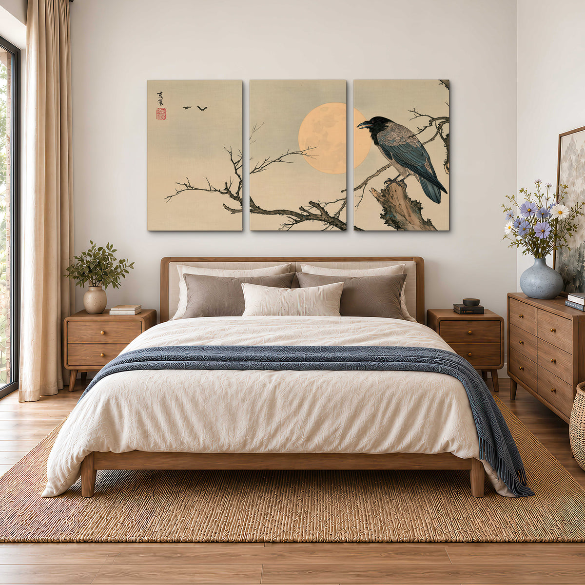 A dark raven perched on a bare branch beside a warm full moon 3 piece canvas wall art styled in an interior