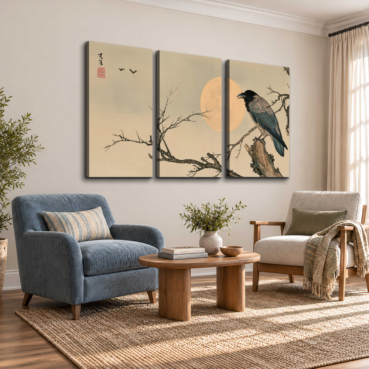 A dark raven perched on a bare branch beside a warm full moon 3 piece canvas wall art styled in an interior