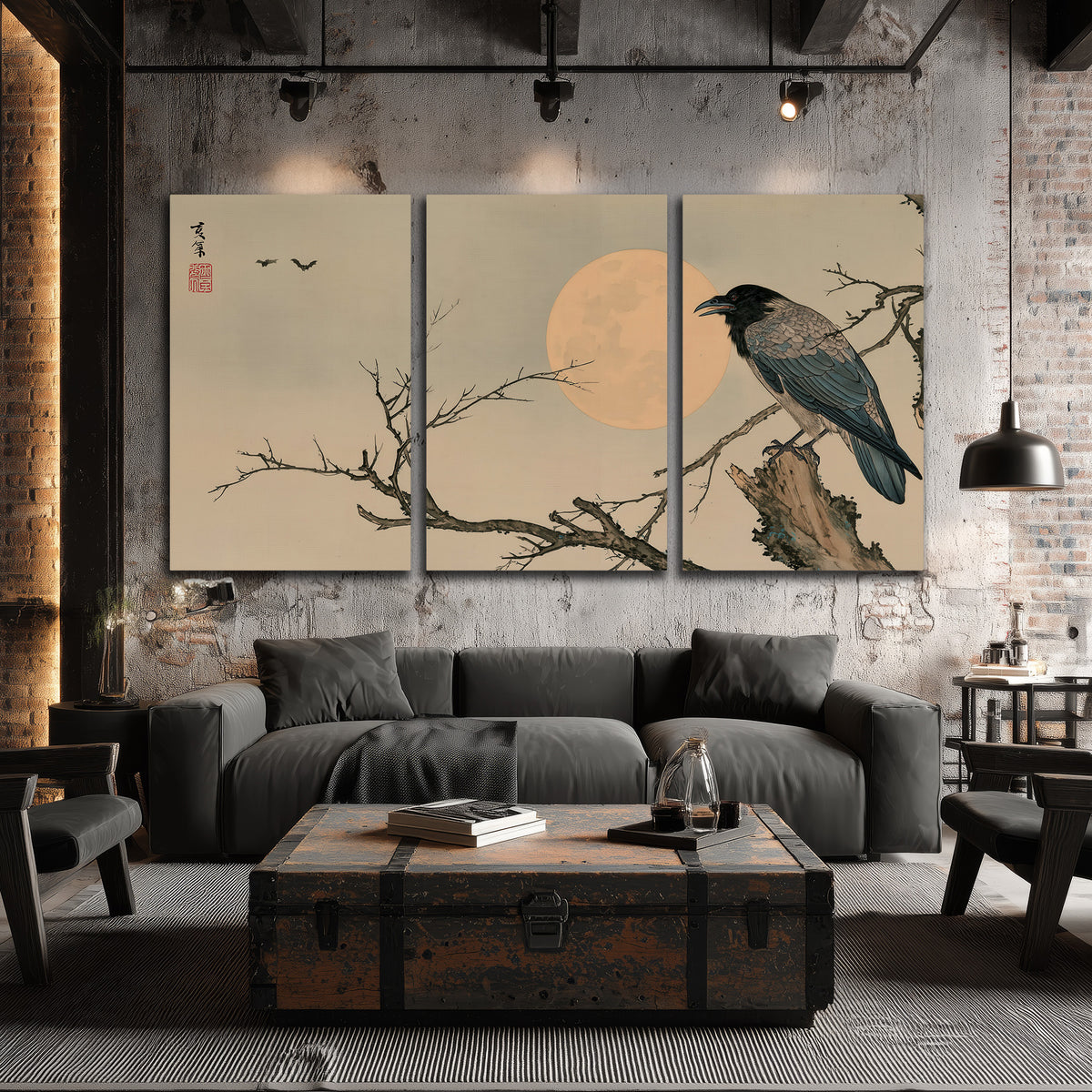 A dark raven perched on a bare branch beside a warm full moon 3 piece canvas wall art displayed in a industrial room