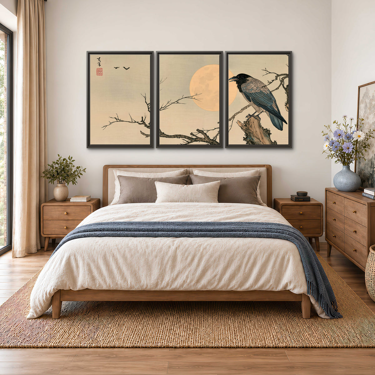 A dark raven perched on a bare branch beside a warm full moon 3 piece framed canvas wall art styled in an interior