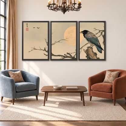 A dark raven perched on a bare branch beside a warm full moon 3 piece framed canvas wall art styled in an interior