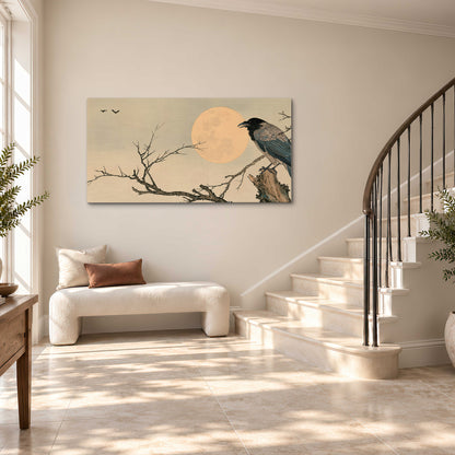 A dark raven perched on a bare branch beside a warm full moon single canvas wall art styled in an interior