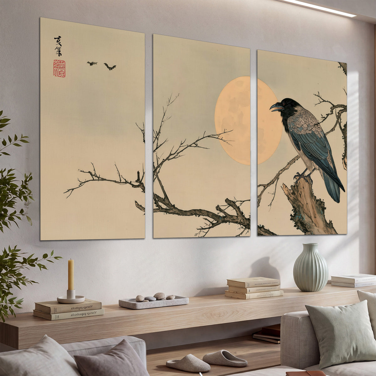 A dark raven perched on a bare branch beside a warm full moon set of 3 poster prints displayed in a console
