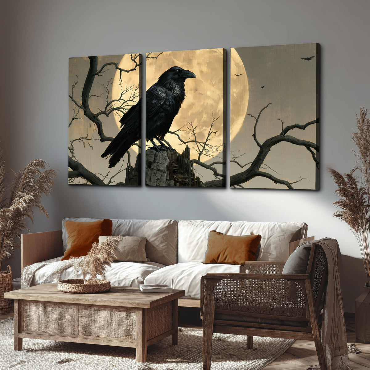 A black raven standing among bare branches in front of a large golden moon 3 piece canvas wall art displayed in a rustic living room