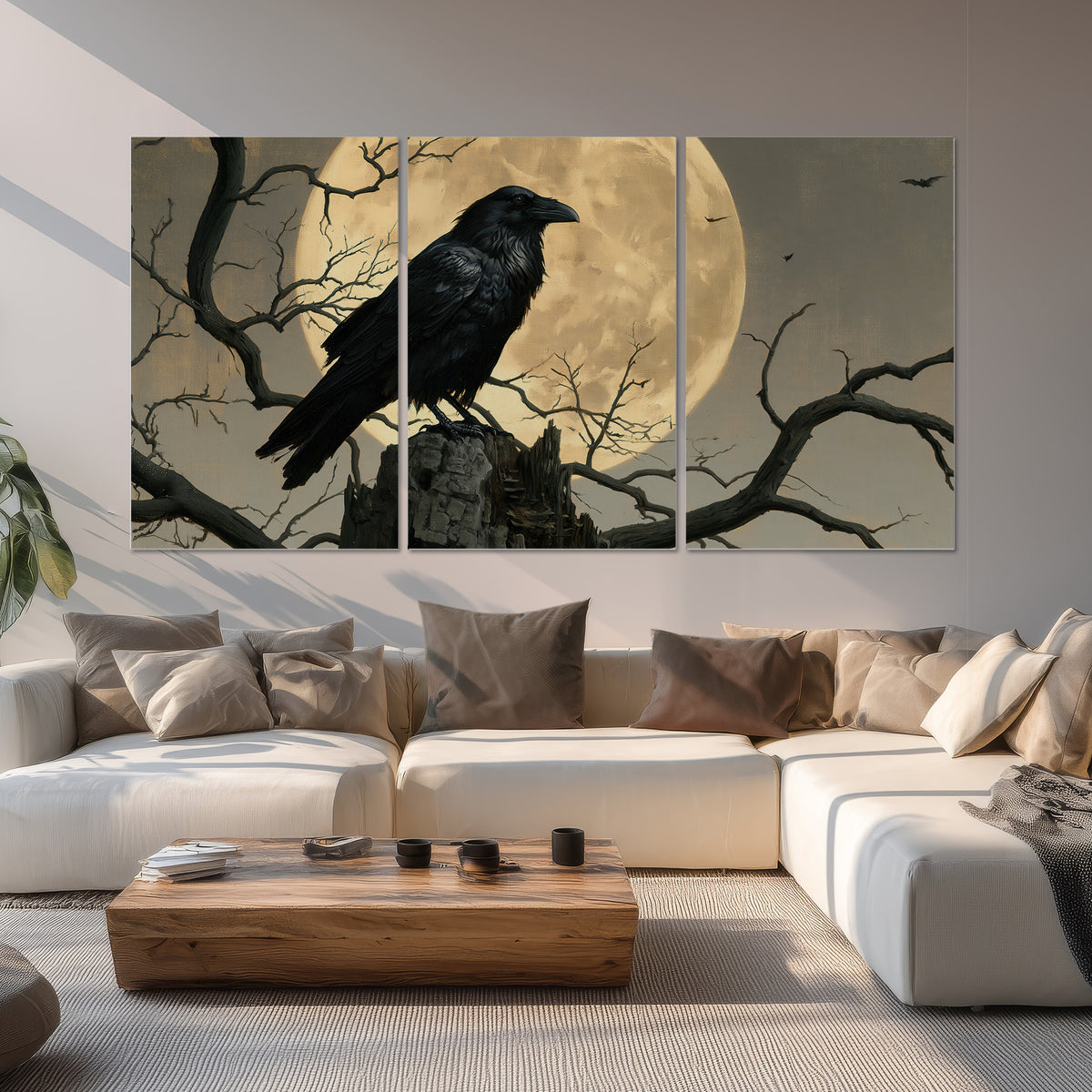 A black raven standing among bare branches in front of a large golden moon set of 3 poster prints displayed in a living room