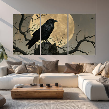 A black raven standing among bare branches in front of a large golden moon set of 3 poster prints displayed in a living room