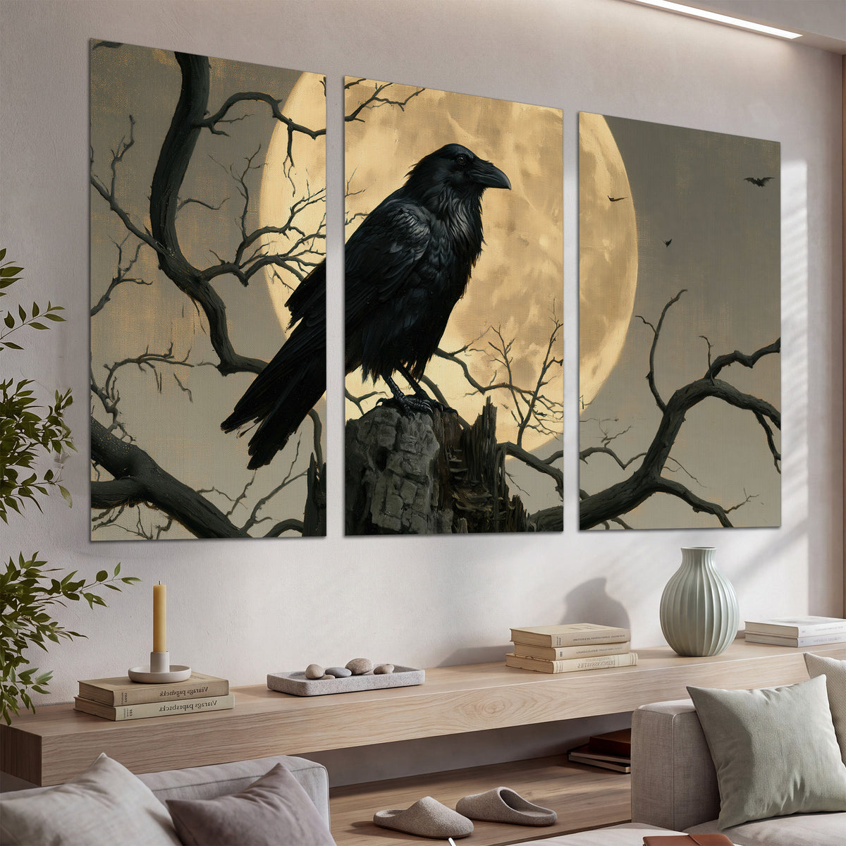 A black raven standing among bare branches in front of a large golden moon set of 3 poster prints displayed in a console