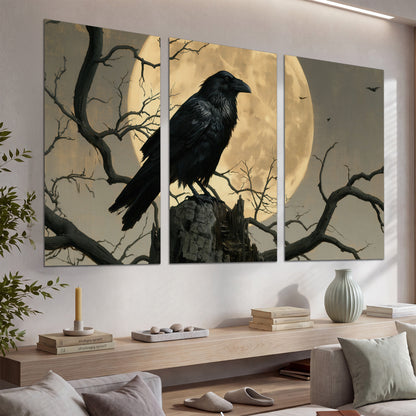 A black raven standing among bare branches in front of a large golden moon set of 3 poster prints displayed in a console