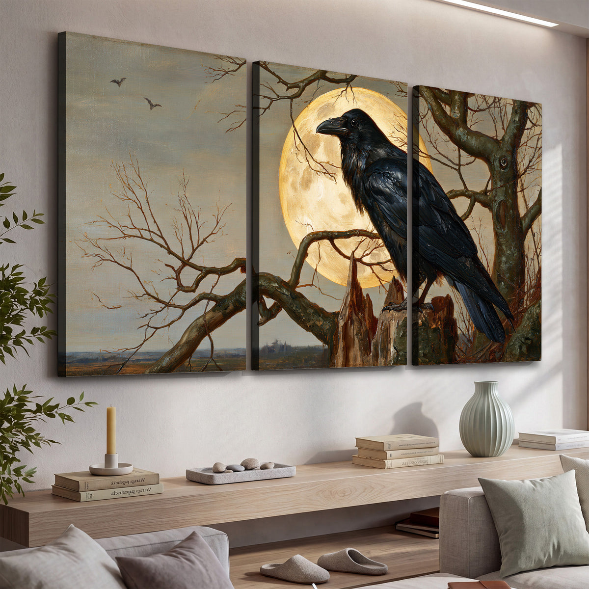 A dark raven perched on a branch beneath a warm moon in a shadowed woodland 3 piece canvas wall art displayed in a console