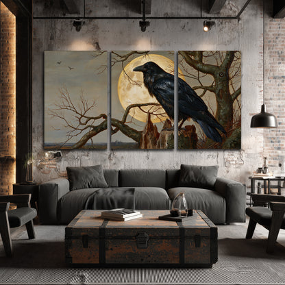 A dark raven perched on a branch beneath a warm moon in a shadowed woodland 3 piece canvas wall art displayed in a industrial room