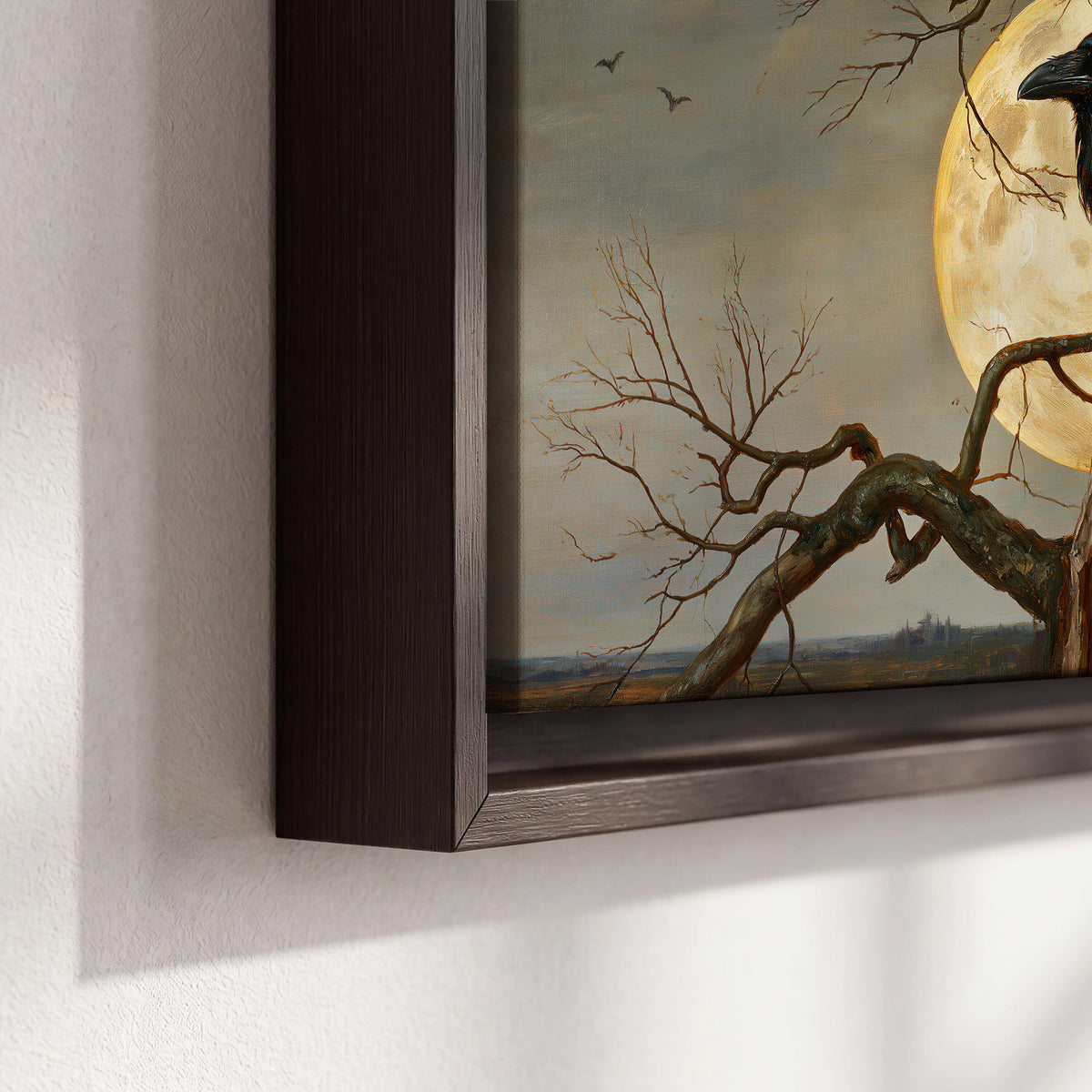 A dark raven perched on a branch beneath a warm moon in a shadowed woodland 3 piece framed canvas wall art material and edge close up