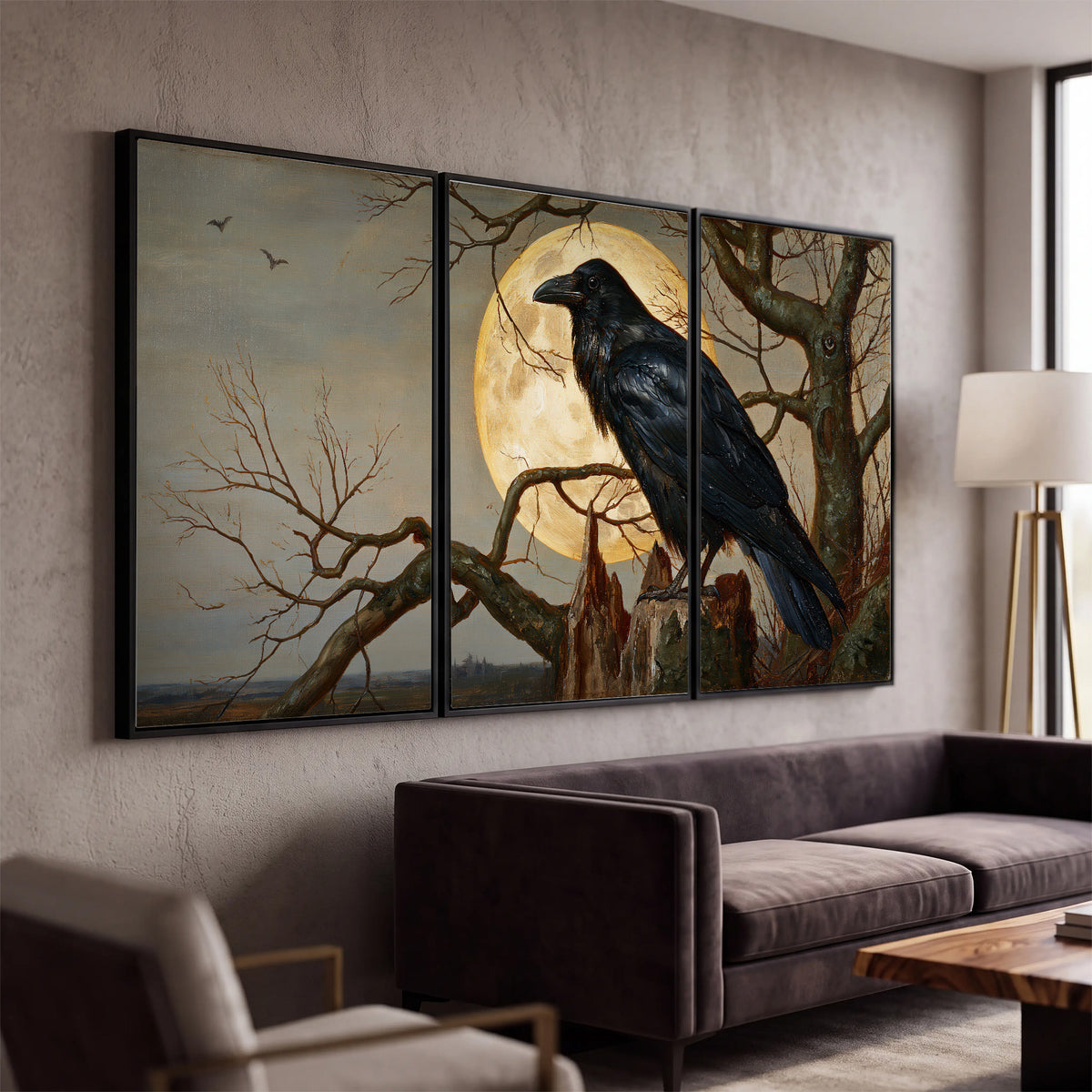 A dark raven perched on a branch beneath a warm moon in a shadowed woodland 3 piece framed canvas wall art displayed in a modern living room