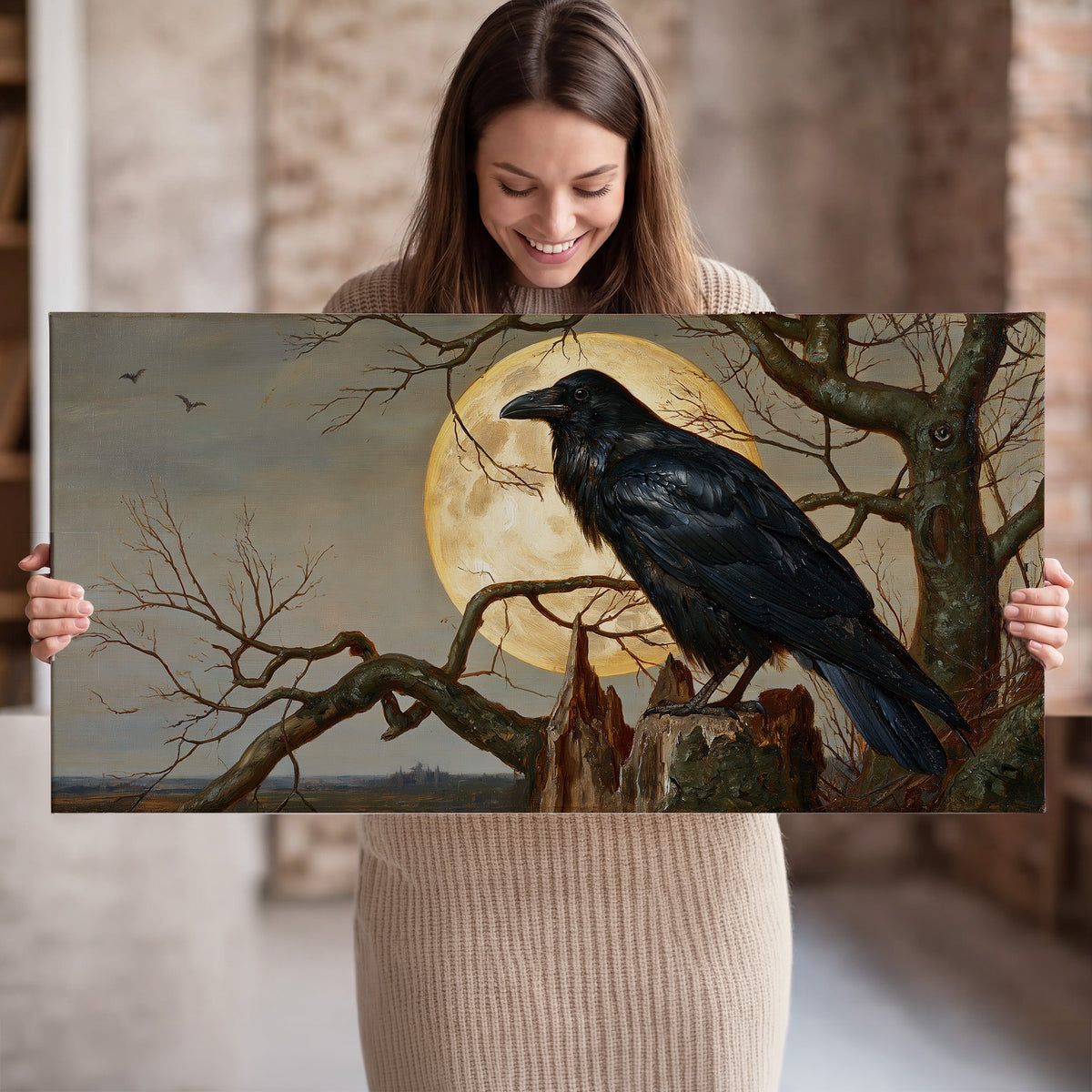 A dark raven perched on a branch beneath a warm moon in a shadowed woodland single canvas wall art held in hands