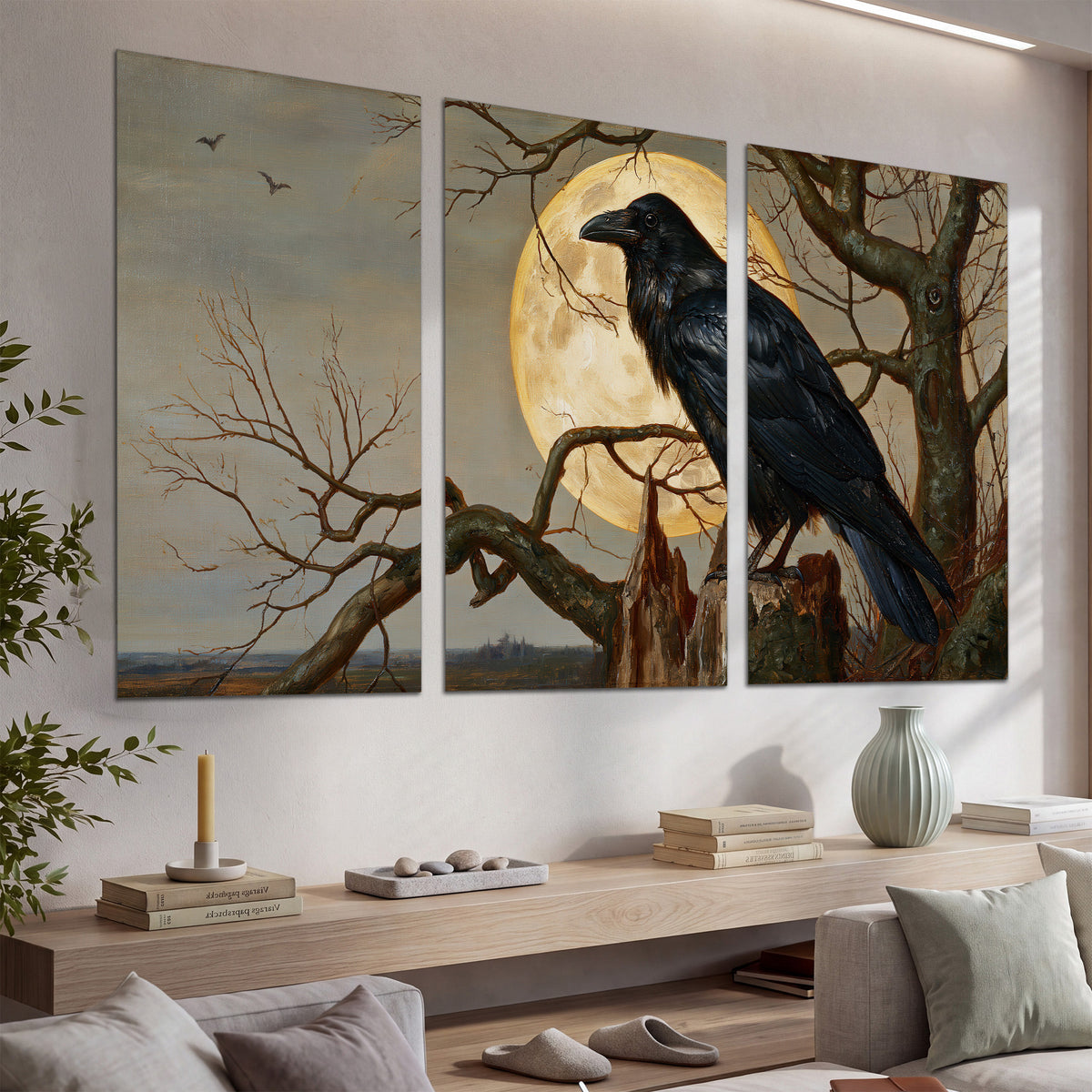 A dark raven perched on a branch beneath a warm moon in a shadowed woodland set of 3 poster prints displayed in a console