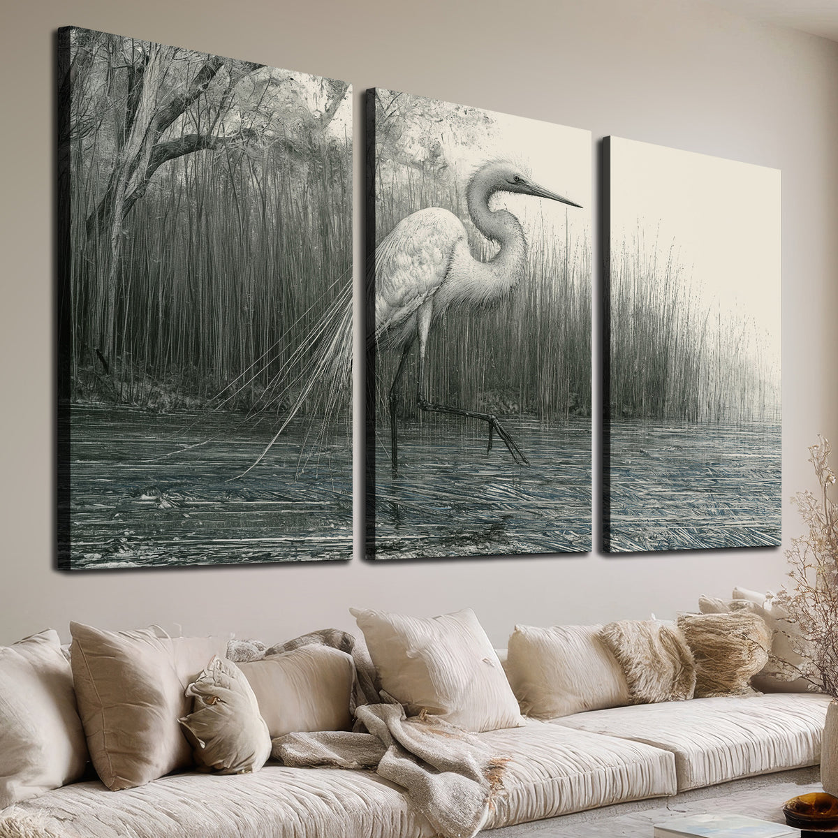 A pale long-legged heron standing beside tall reeds in a muted gray-green wetland 3 piece canvas wall art room and product view