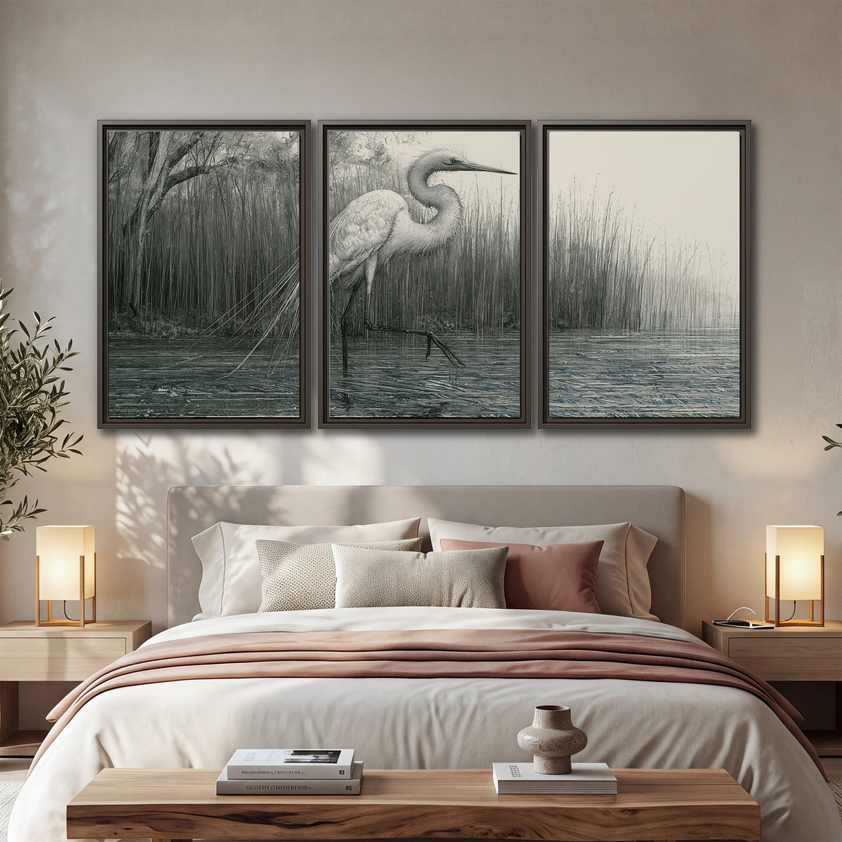 A pale long-legged heron standing beside tall reeds in a muted gray-green wetland 3 piece framed canvas wall art displayed in a bedroom
