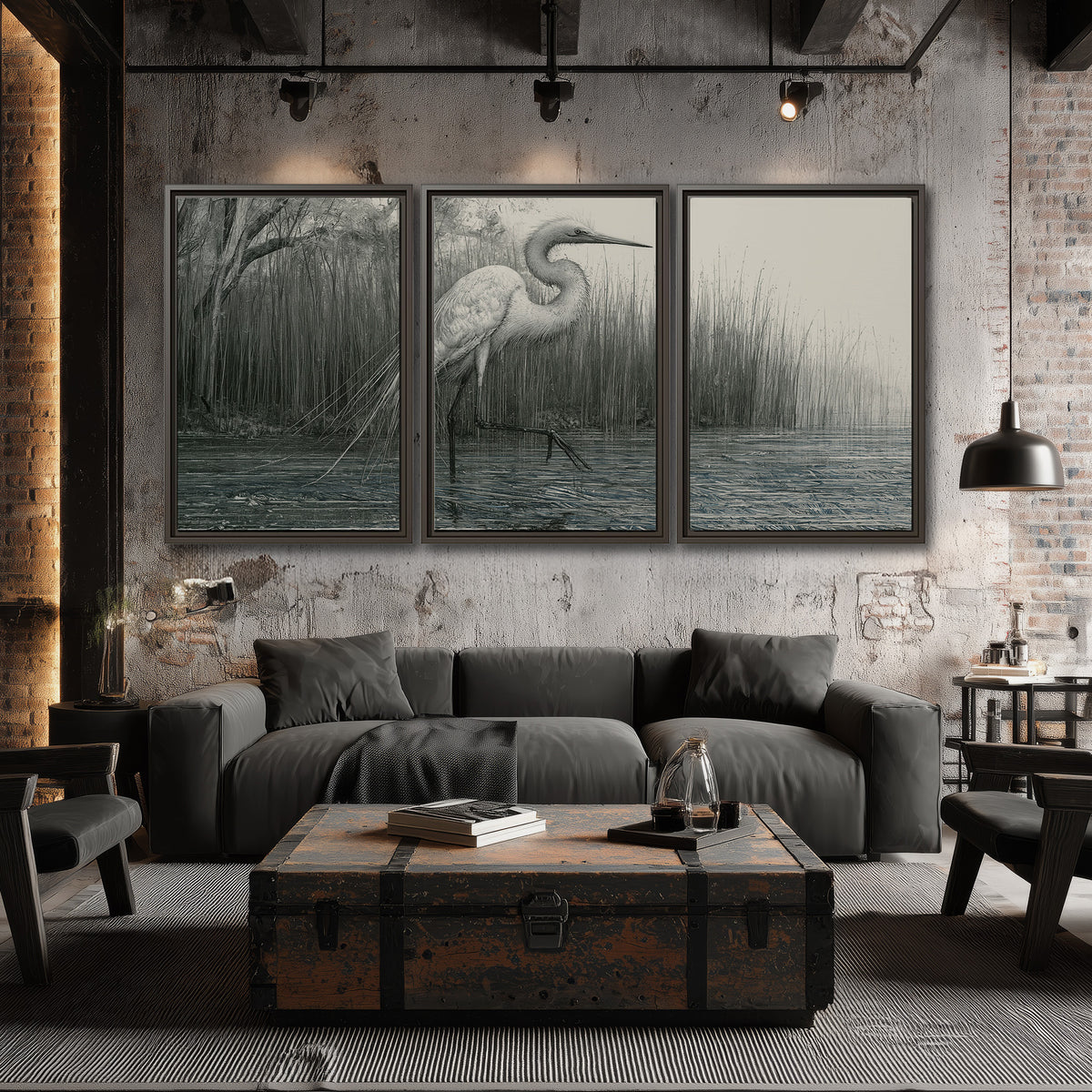 A pale long-legged heron standing beside tall reeds in a muted gray-green wetland 3 piece framed canvas wall art displayed in a industrial room