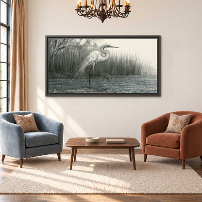 A pale long-legged heron standing beside tall reeds in a muted gray-green wetland single framed canvas wall art styled in an interior