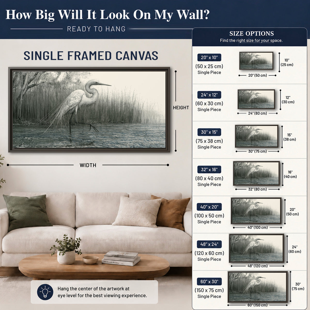 A pale long-legged heron standing beside tall reeds in a muted gray-green wetland single framed canvas wall art size guide above a sofa; room view is illustrative