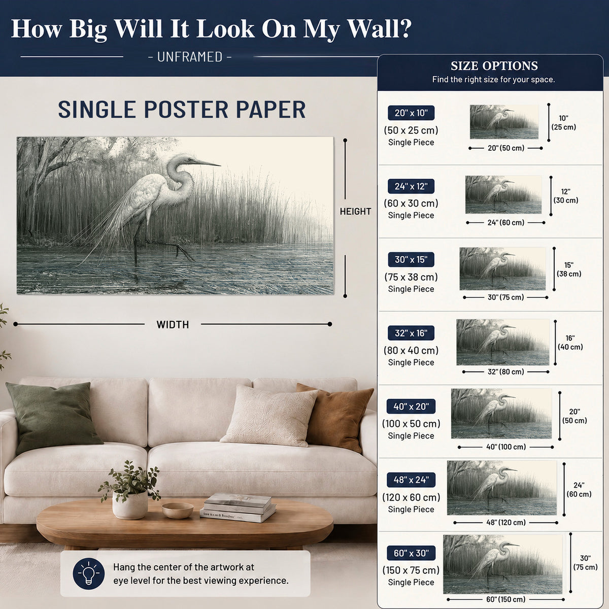 A pale long-legged heron standing beside tall reeds in a muted gray-green wetland single poster print size guide above a sofa; room view is illustrative