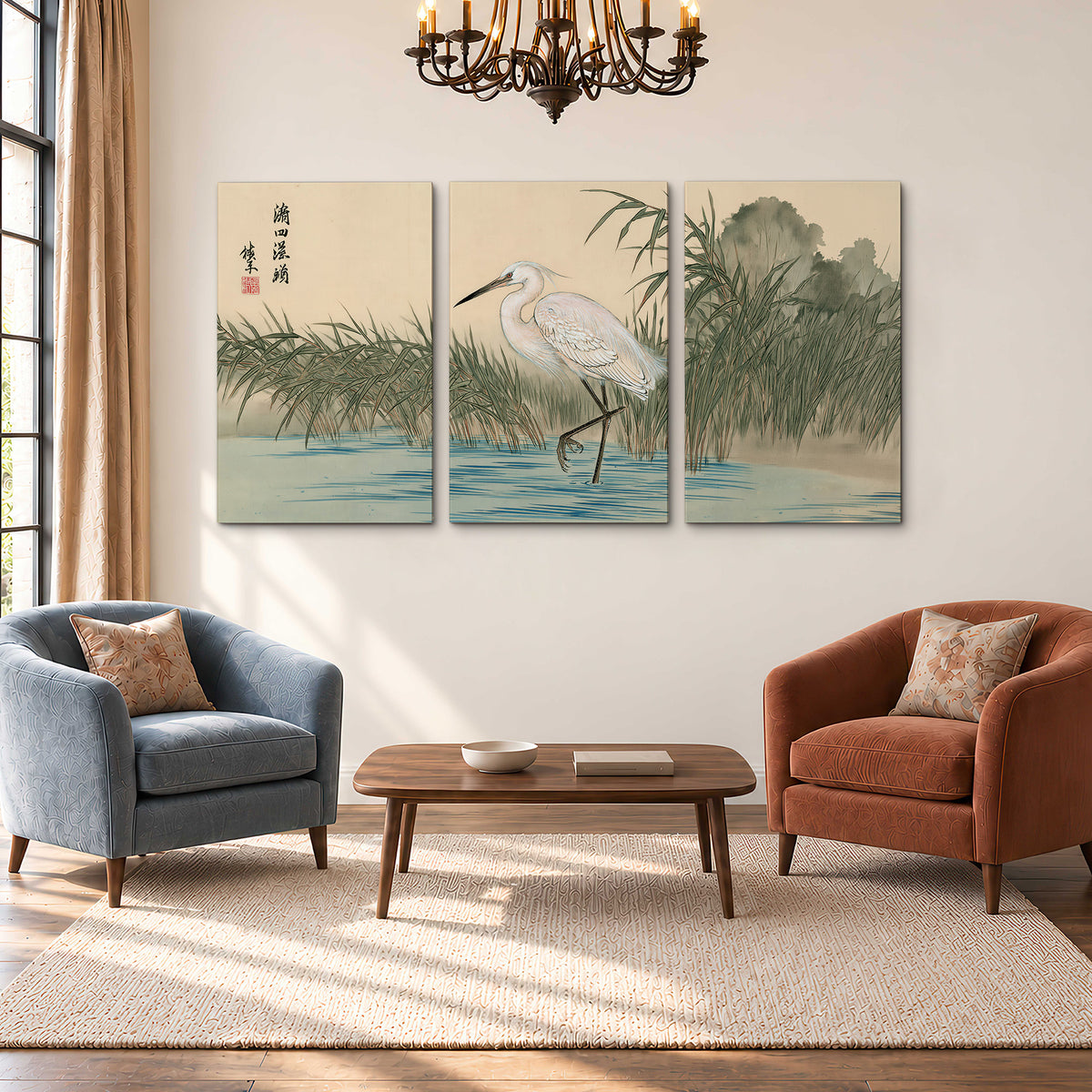 A white heron standing beside a quiet river with reeds and distant hills 3 piece canvas wall art styled in an interior