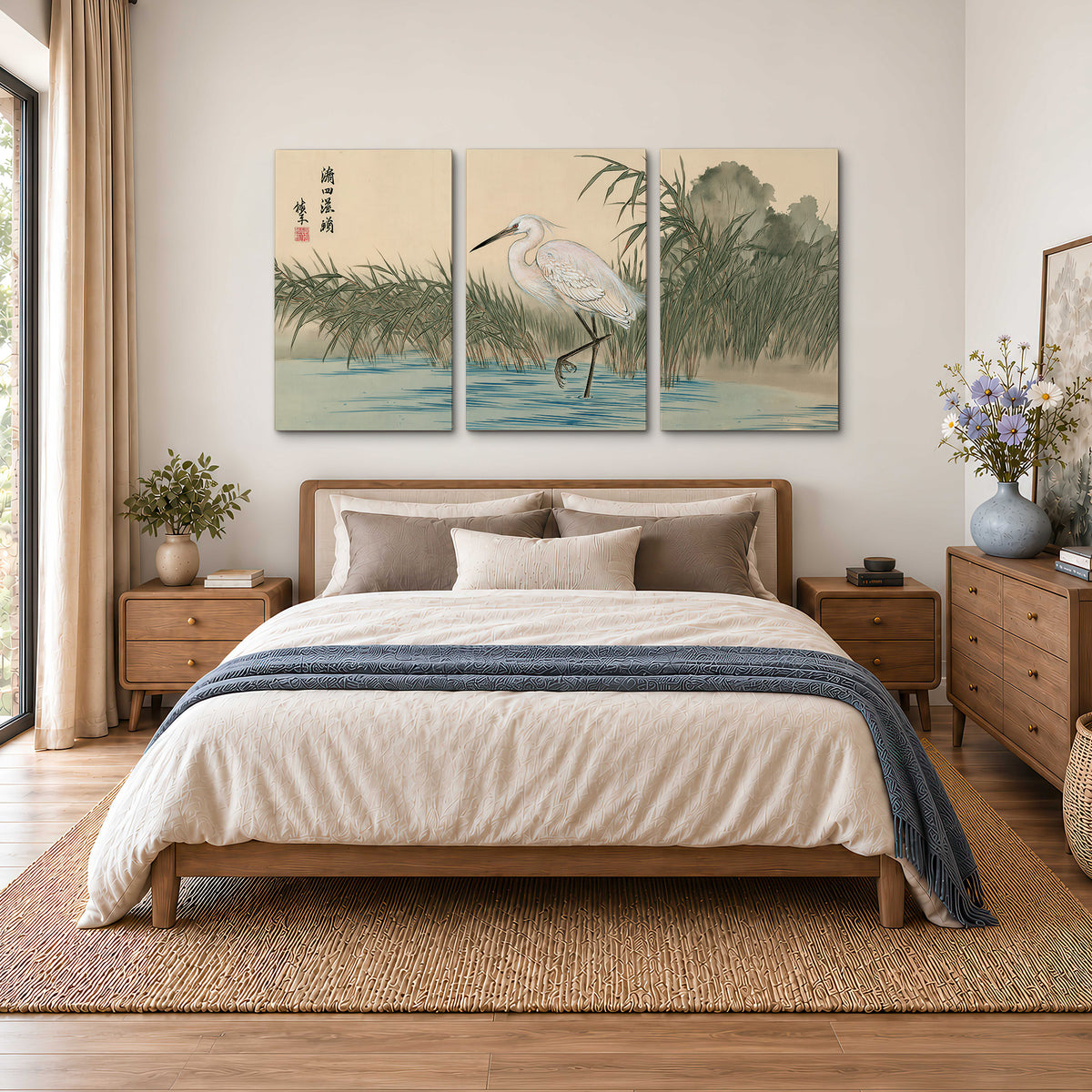 A white heron standing beside a quiet river with reeds and distant hills 3 piece canvas wall art styled in an interior
