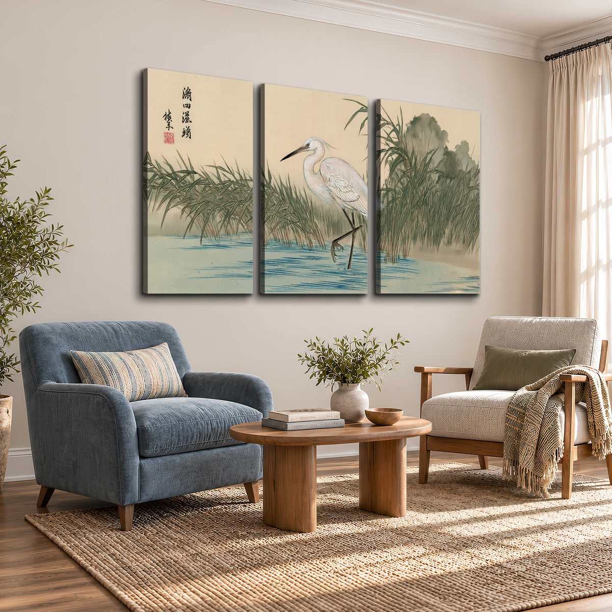 A white heron standing beside a quiet river with reeds and distant hills 3 piece canvas wall art styled in an interior