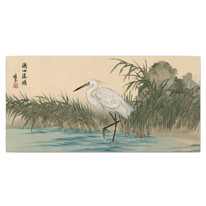 A white heron standing beside a quiet river with reeds and distant hills single canvas wall art viewed straight on