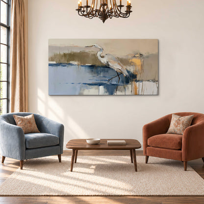 A slender heron standing in blue water among loose ochre and cream brushstrokes single canvas wall art styled in an interior