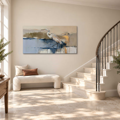 A slender heron standing in blue water among loose ochre and cream brushstrokes single canvas wall art styled in an interior